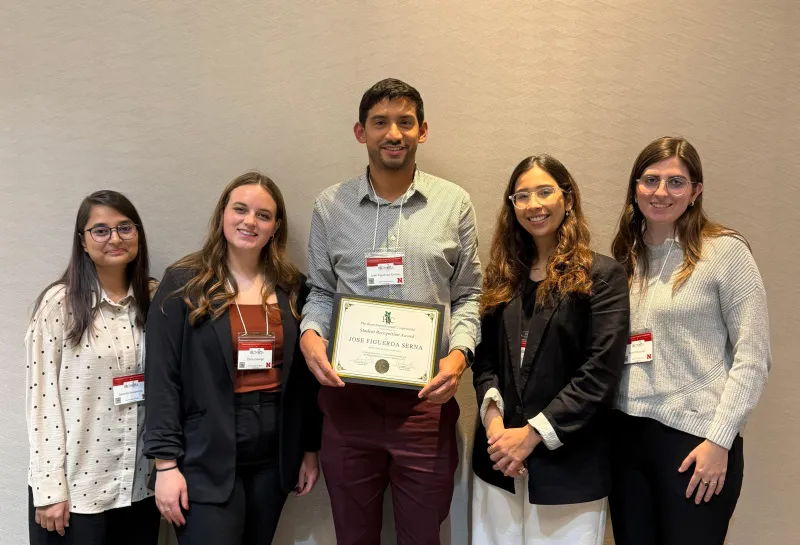 Jose and other students at Bean Improvement Cooperative meeting