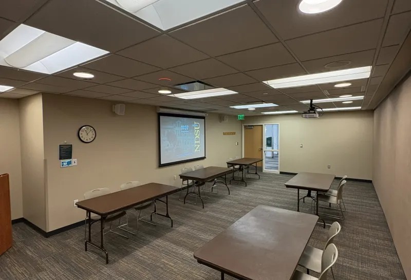 Lark room with display tables arrangement