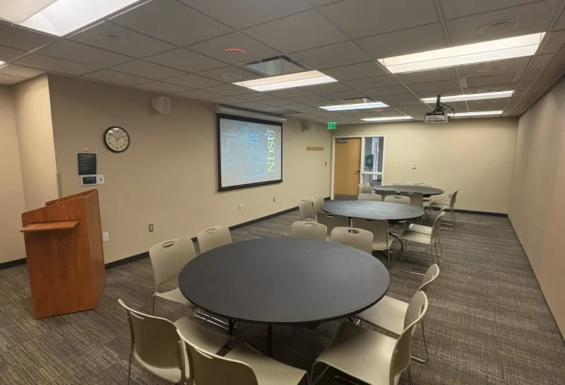 Lark room with round table arrangement