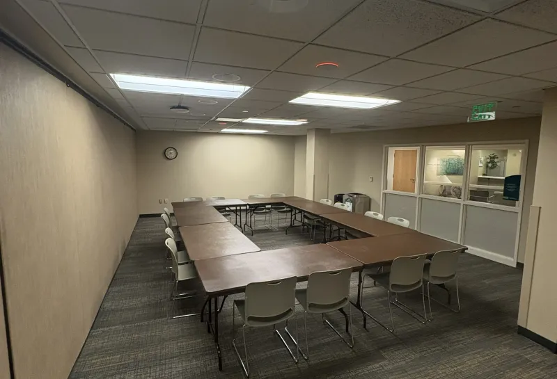 Meadow room with open square tables arrangement