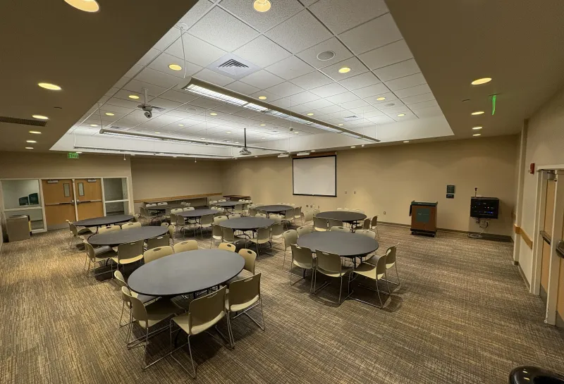 Sahnish room setup with round tables