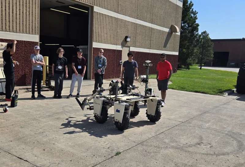 explore engineering students work with precision Ag robot