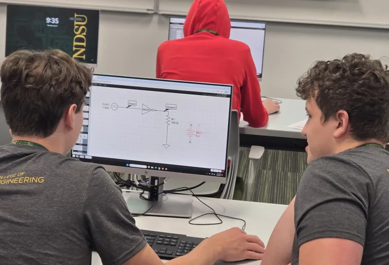 explore engineering students work on electrical engineering