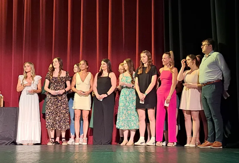 Students standing on stage at the Spring 2024 SoDAA Sendoff.