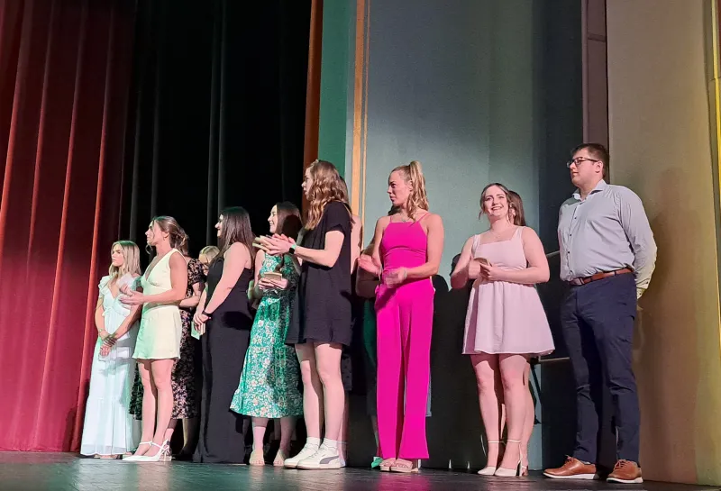 Students standing on stage at the Spring 2024 SoDAA Sendoff.