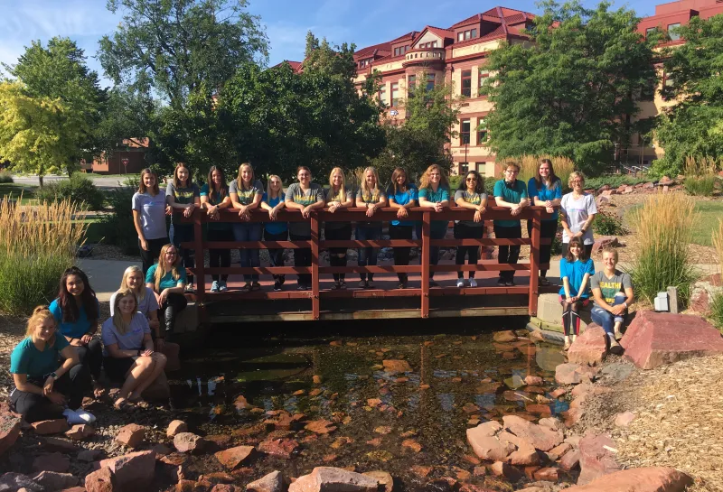 Group of peer educators posing at the Babbling Brook