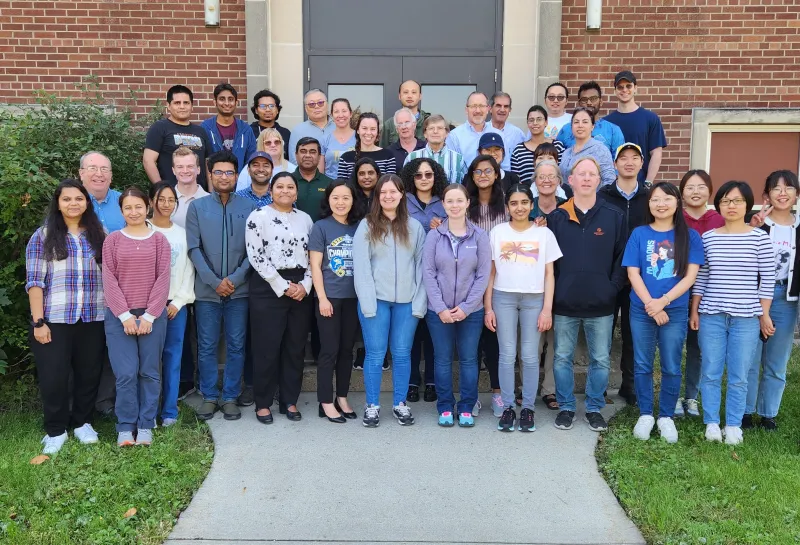 picture of the whole department in front of harris Hall