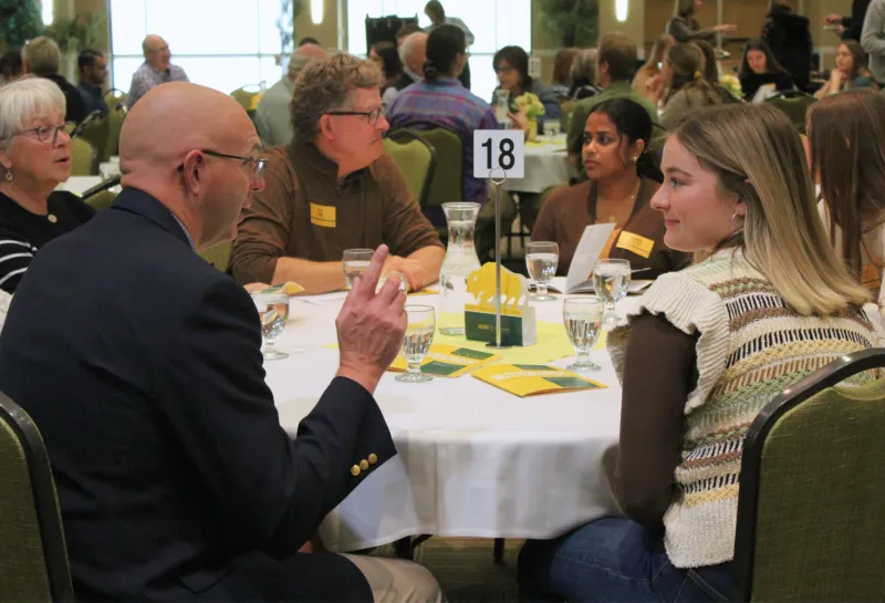 Scholarship donor and recipient visiting