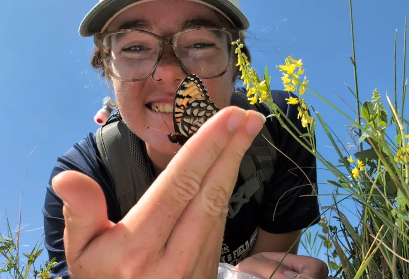 Taleigh Adrian with butterfly on hand