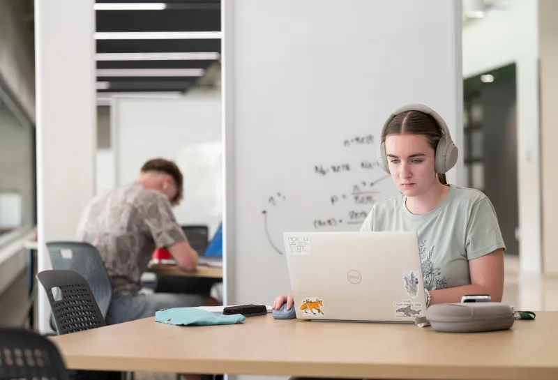 student studying in mortenson commons