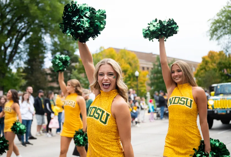 NDSU cheer team participates in the Homecoming parade