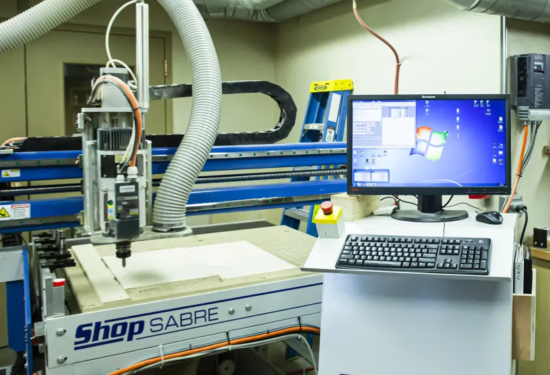 Woodshop machine used for cutting wood.