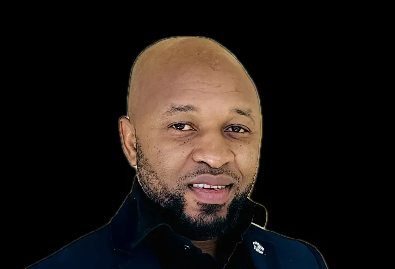 Ogechukwu smiling confidently at camera.