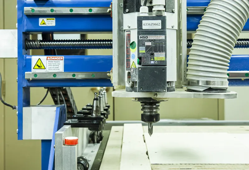 Machine used for cutting wood in woodshop.