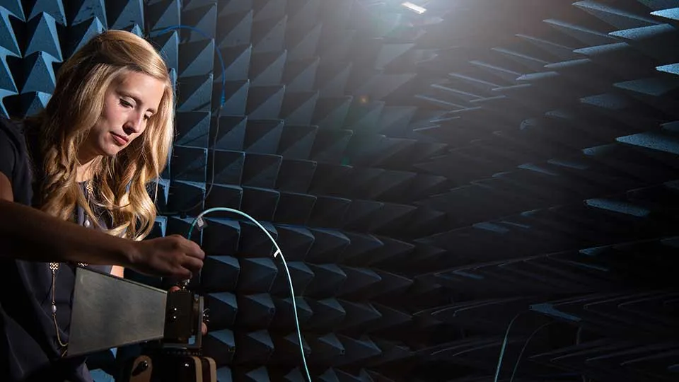 student measuring electric properties of a biological sample