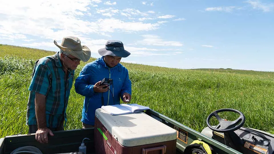 wetland researcher with graduate student