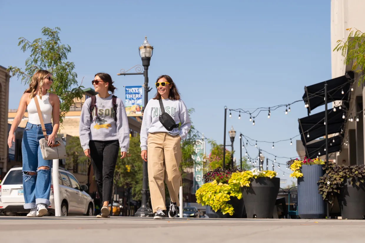 NDSU students walk in downtown Fargo