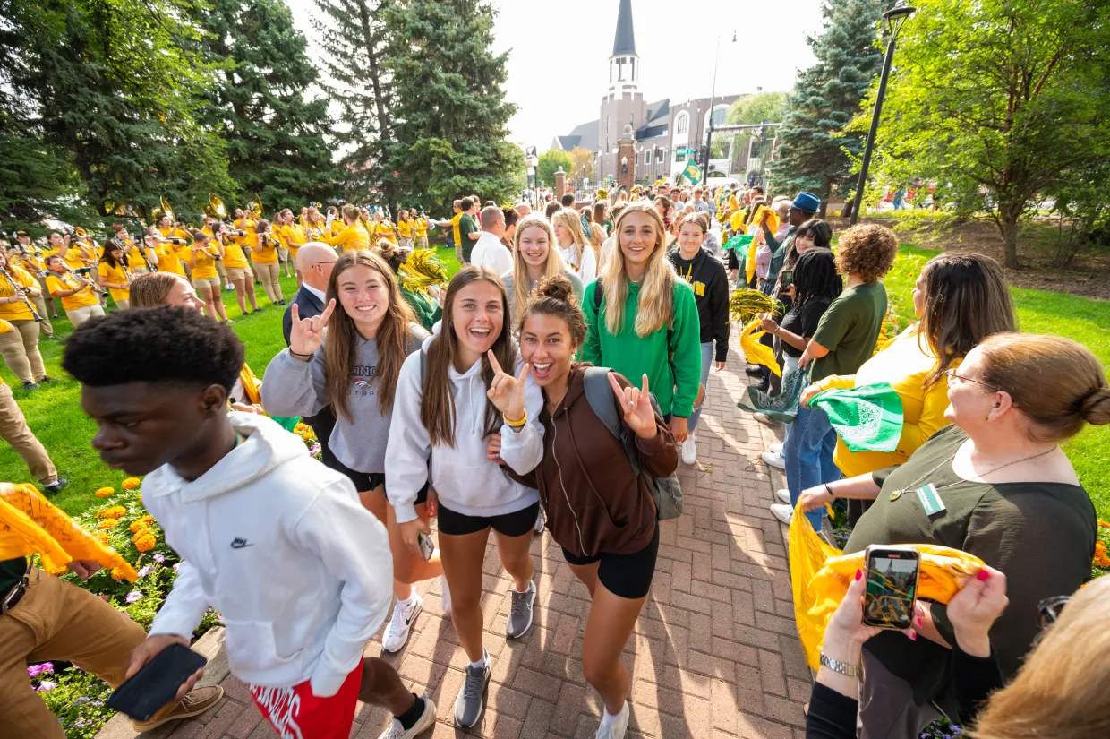 students walking through gates during welcome week