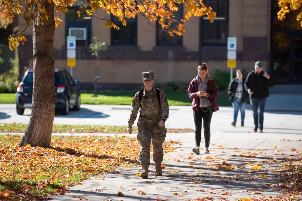 student in uniform on campus