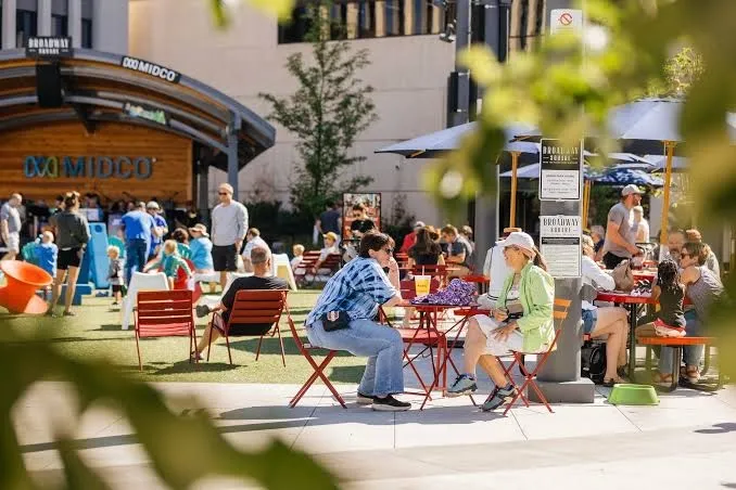 People sitting at Red River Market