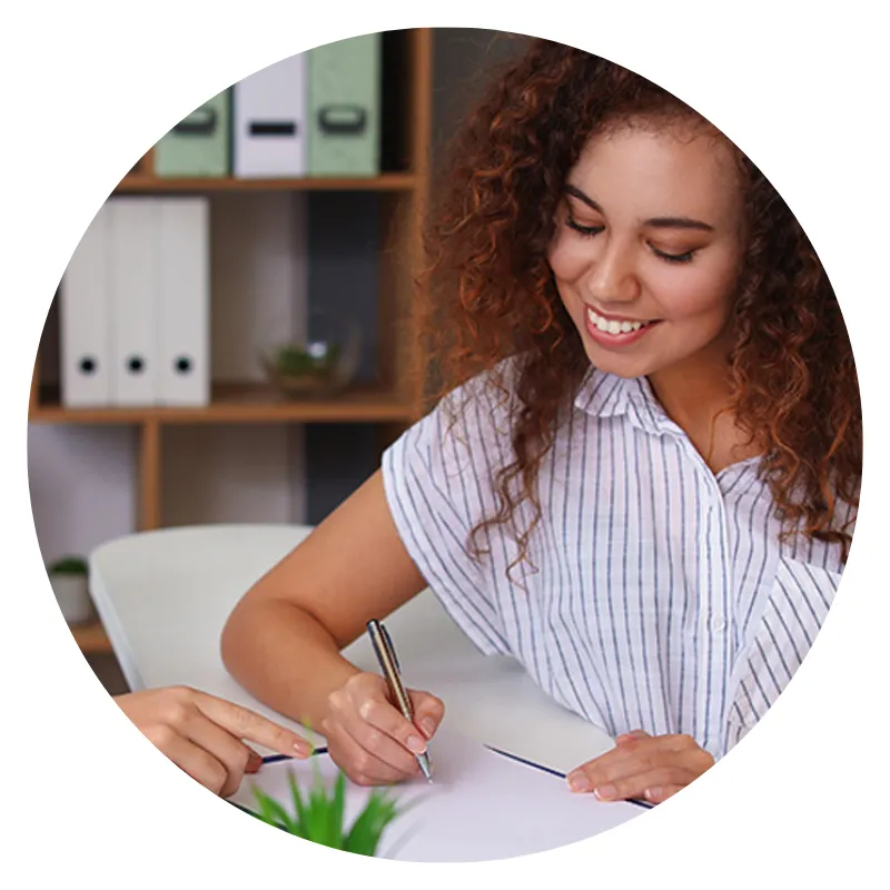 Healthcare professional writing with a pen and helping someone 