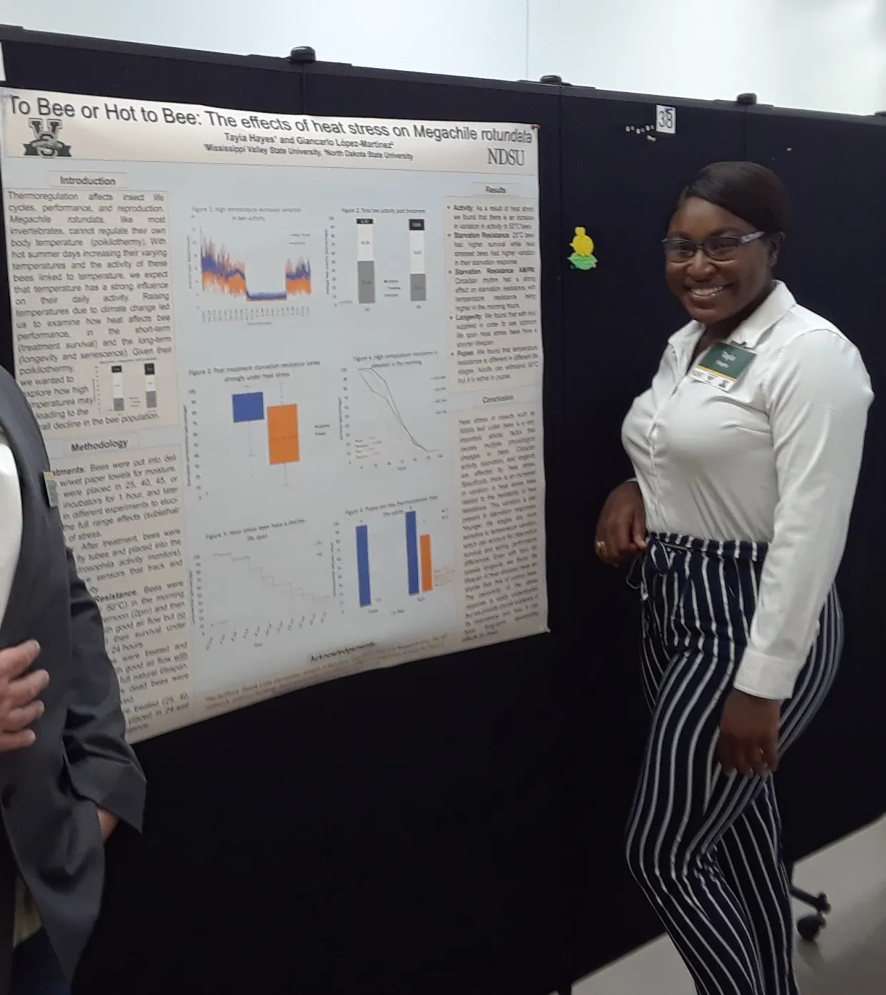 Undergraduate student, Tayia Hayes presenting her poster.