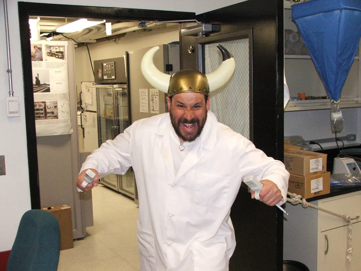 A scientist having too much fun with pipetts.