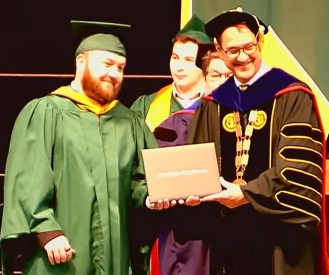 Jack receiving his MS degree.