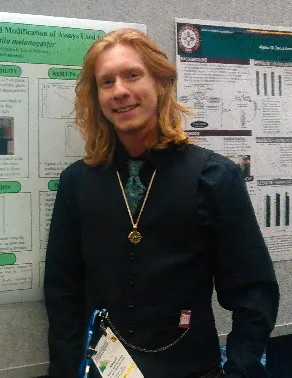 Michael presenting a poster and looking great!