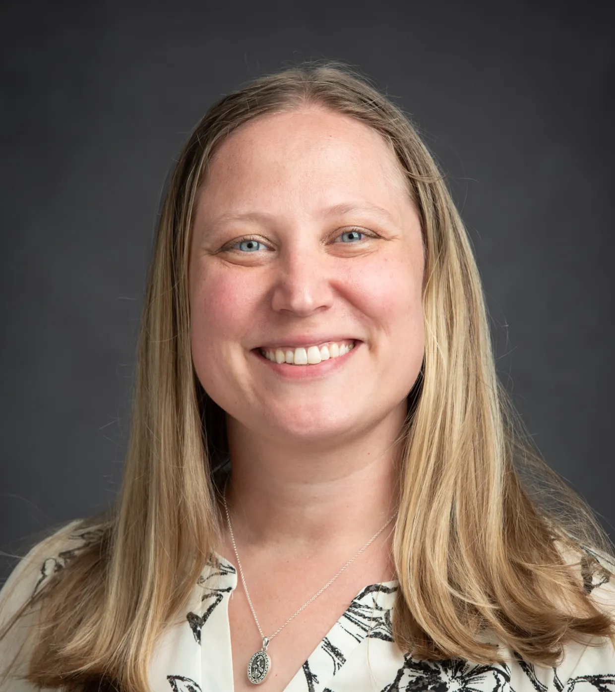 Dr. Anna Finley smiling at the camera