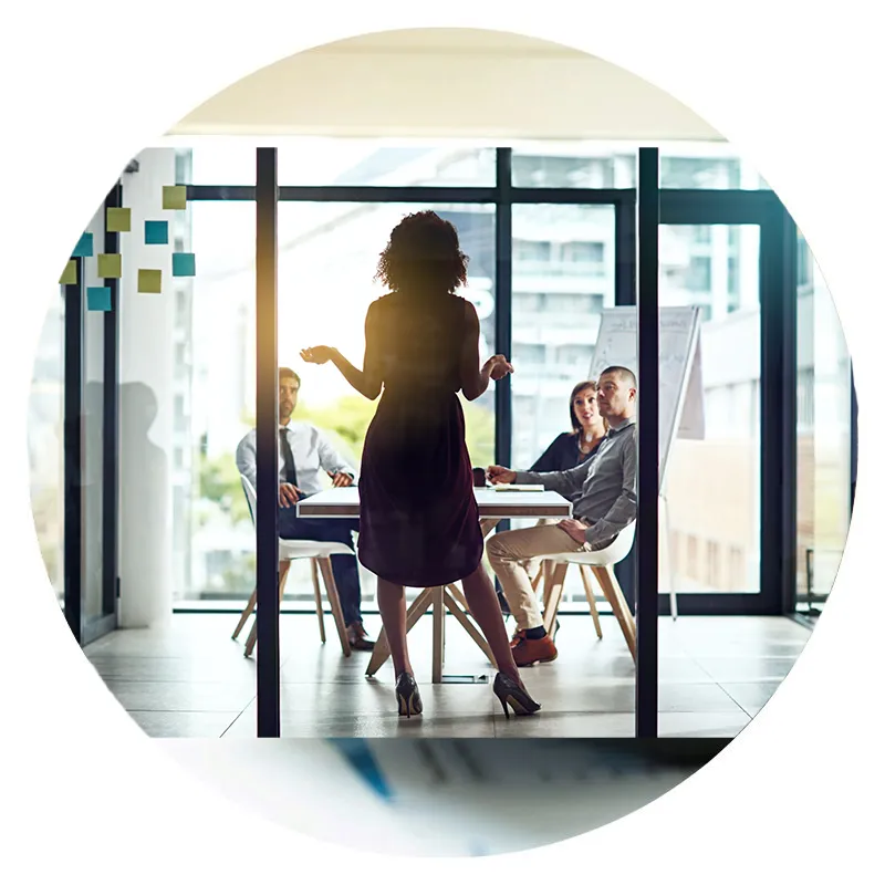 Woman Manager leading a team meeting