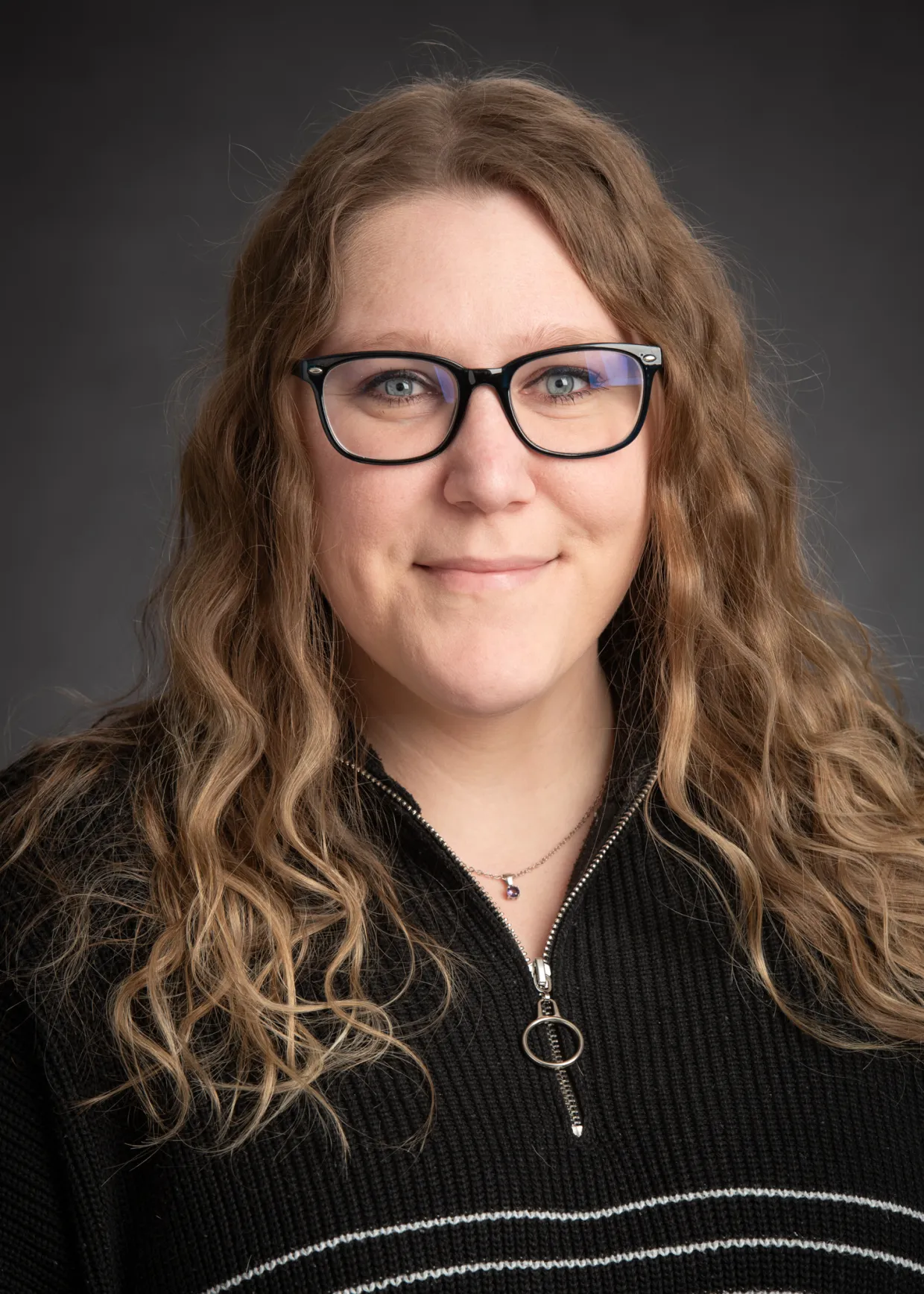 Dereka Bauscher in a black sweatshirt 