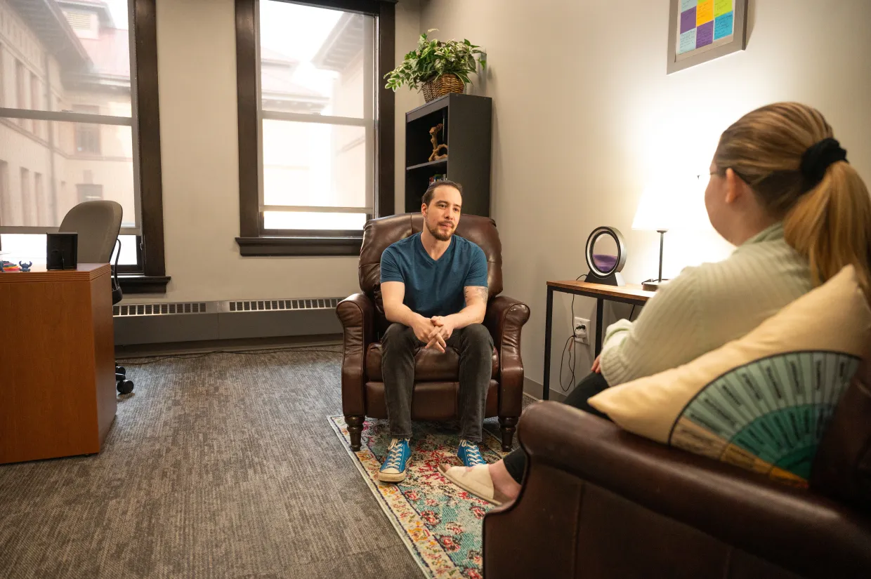 A student talks with a counselor at the Counseling Center.