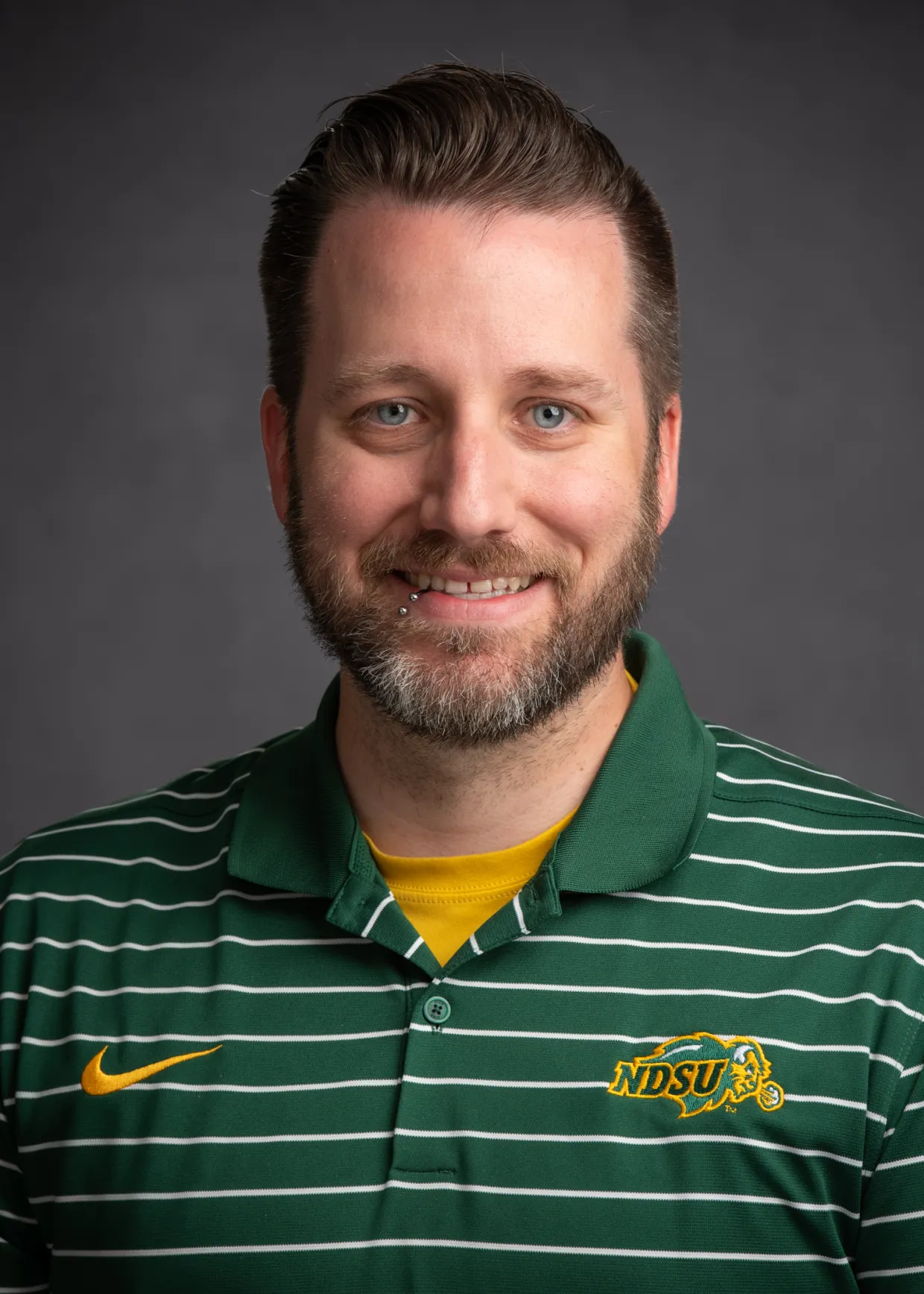 Dr Seaborn smiling confidently at camera.