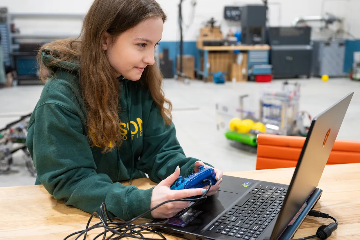 NDSU Software Engineering student Kaitlyn Nickel works on a robotics project