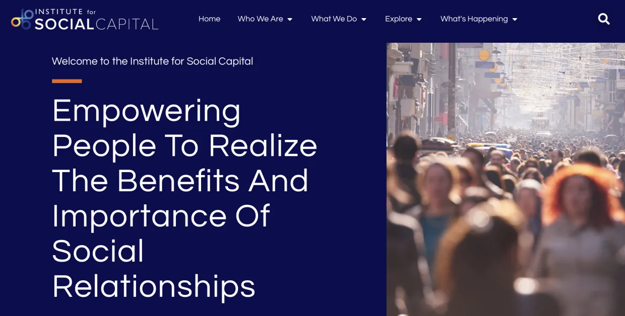 white writing on left side and people in a crowd walking on the right side