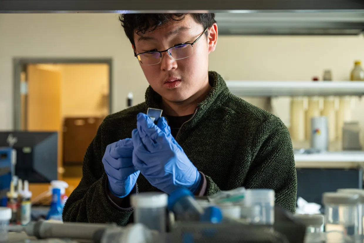NDSU student Zuban Park performs an experiment in the chemistry lab
