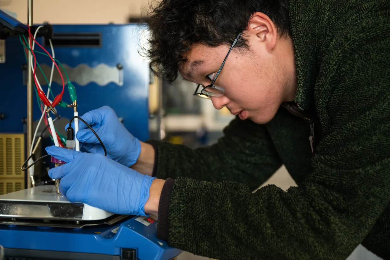 NDSU student Zuban Park performs an experiment in the chemistry lab