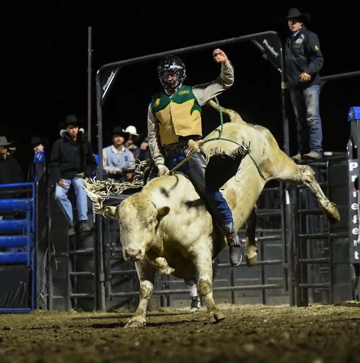 NDSU Alumni Lathan Demontigny Riding Bull at Rodeo