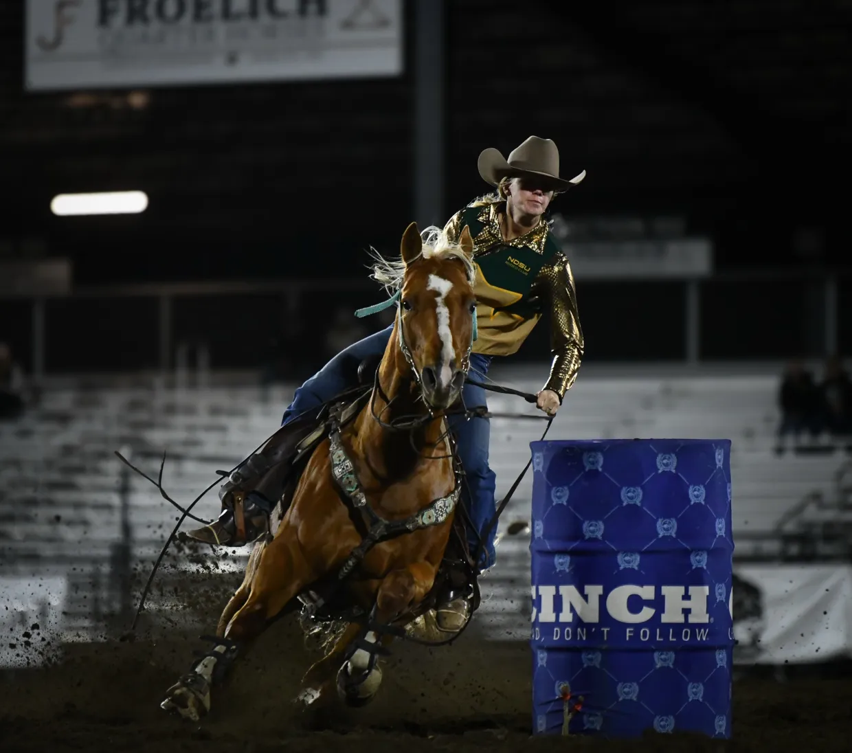 NDSU Alumni Megan Larson Riding Horse During Barrel Racing at Rodeo