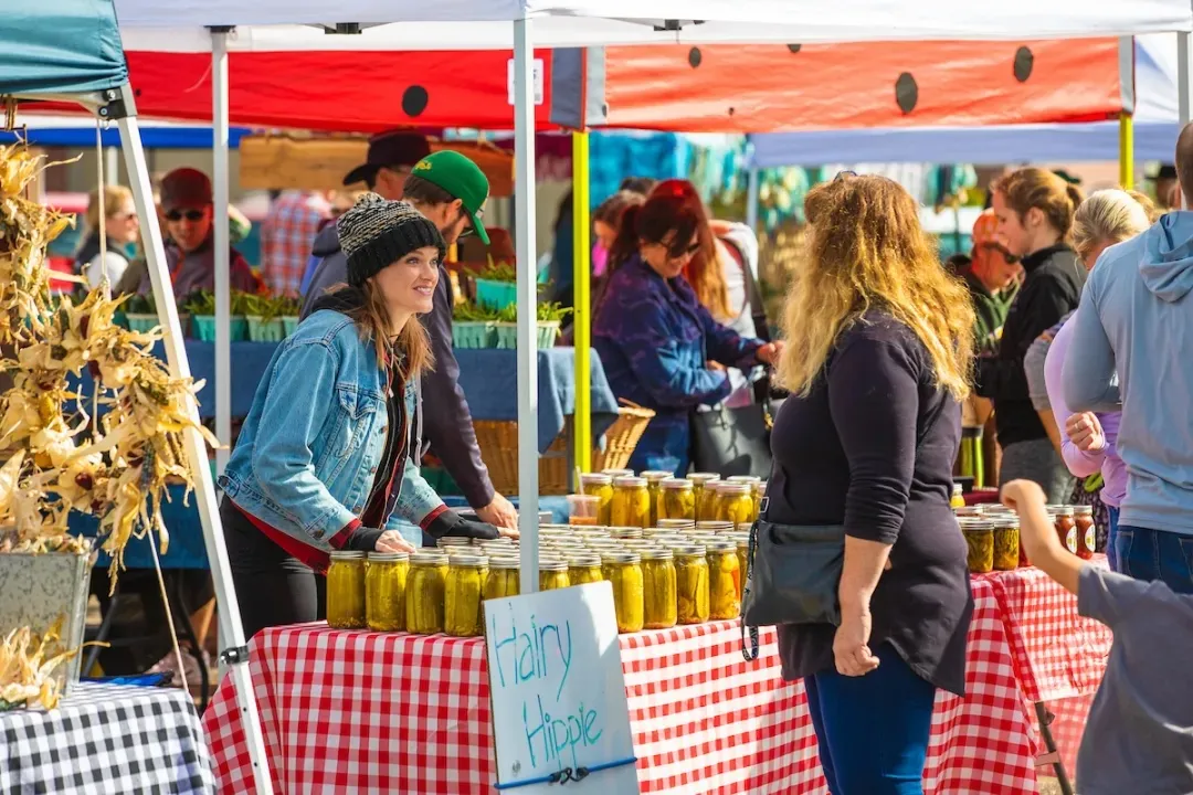 A pickle vendor at the Red River Market