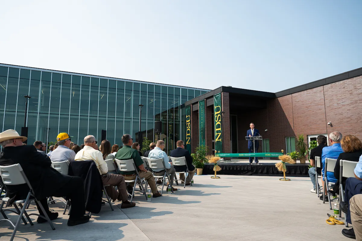 NDSU President Stewart speaking at the Bolley Agricultural Laboratory. 