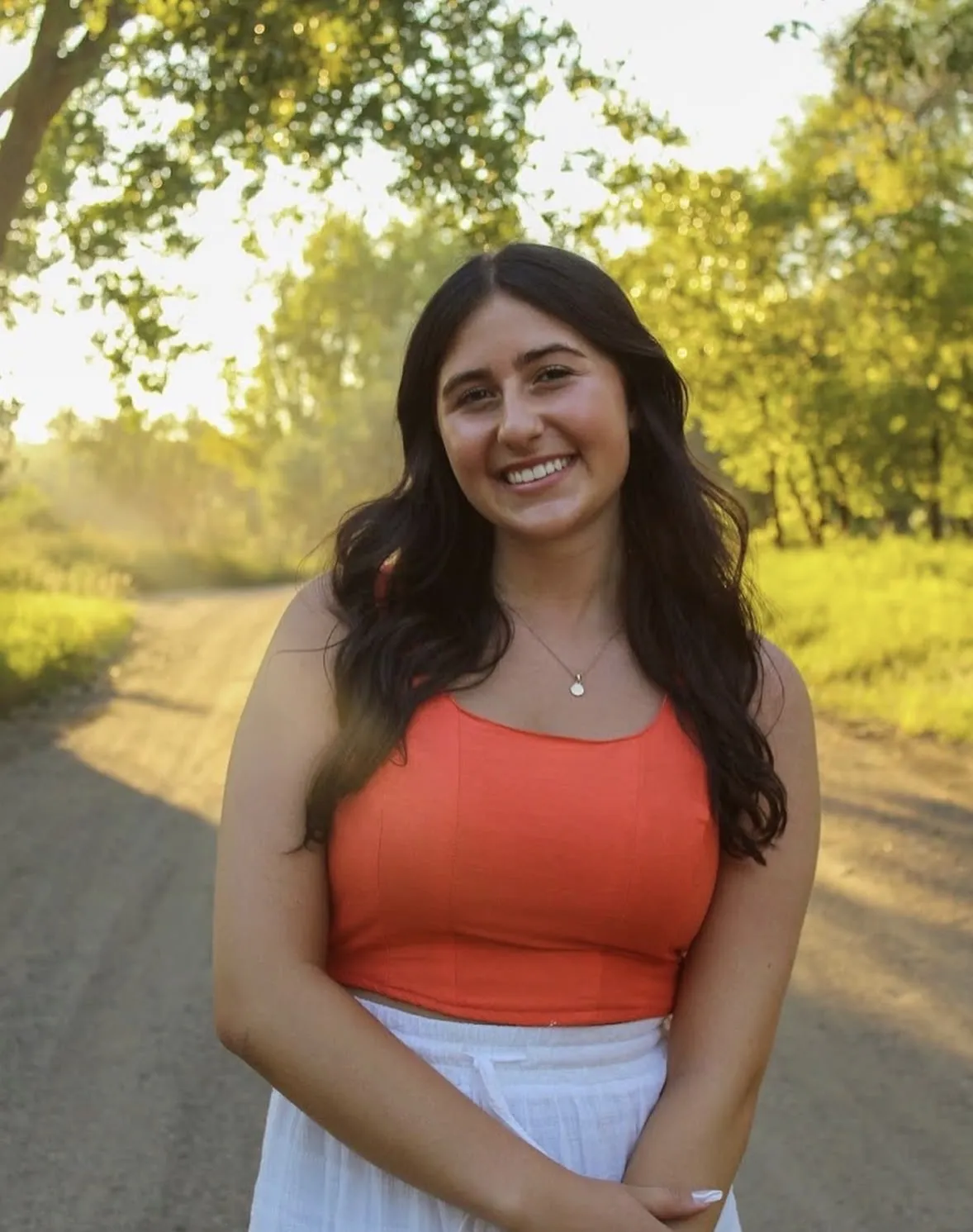 Amber smiling confidently at camera.