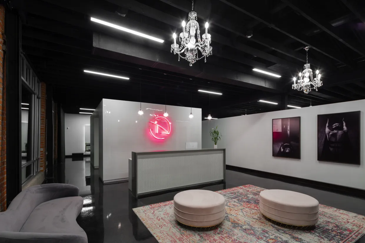 Office space with desk and sitting area.