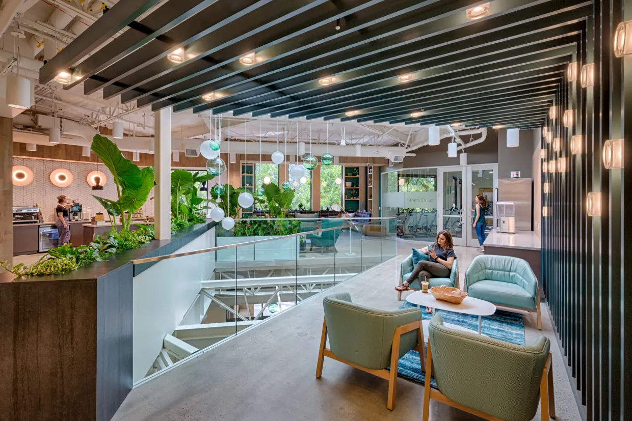 Seating area on second floor of building.