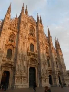 a cathedral on a partly cloudy day