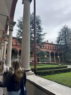 Students walking down a corridor of a university