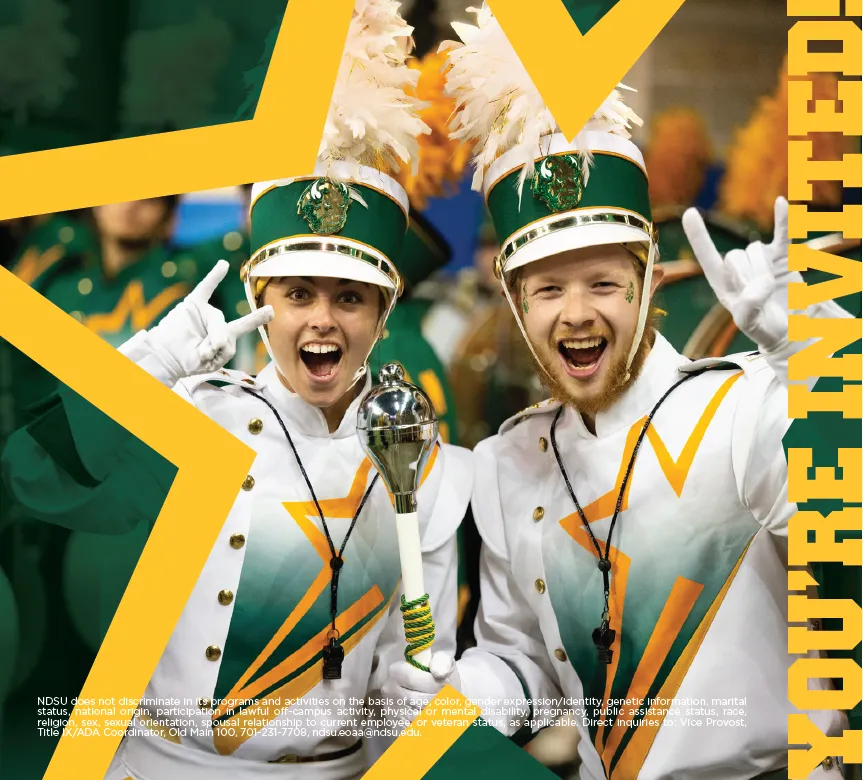 A woman and a man in NDSU marching band gear and smiling at the camera