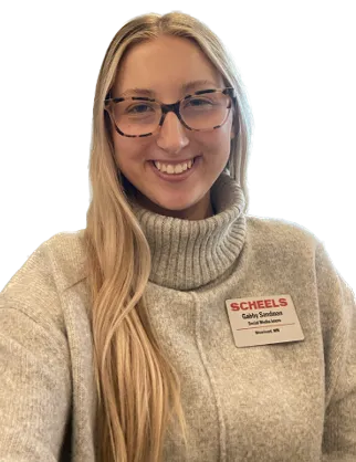 Sandman smiling confidently at camera.