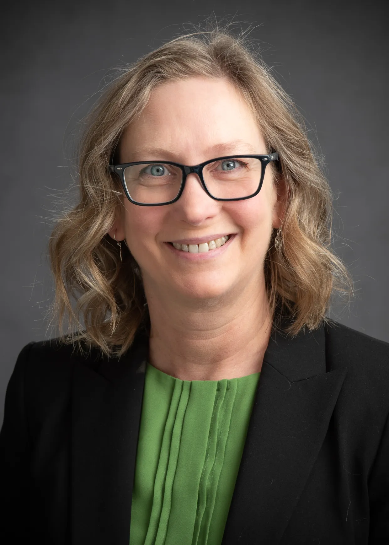 Kendra Greenlee smiling confidently.